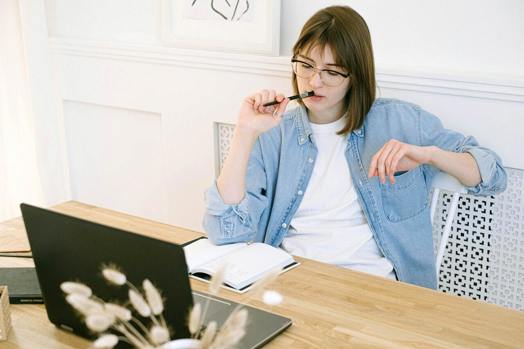 Lady looking at laptop